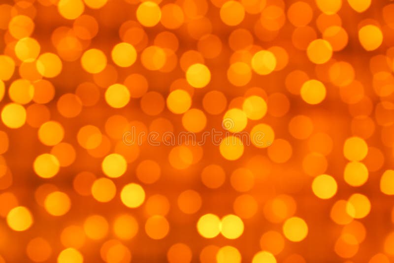 Suddiga orange ljus som bakgrund royaltyfria foton Suddiga orange ljus som bakgrund royaltyfria foton