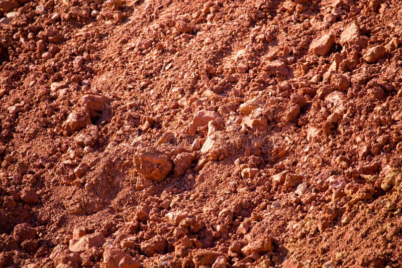 Suelo De Arcilla Roja En La Naturaleza Como Fondo Imagen de archivo -  Imagen de fondo, texturizado: 107793929