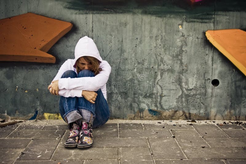 Suffering woman on wall