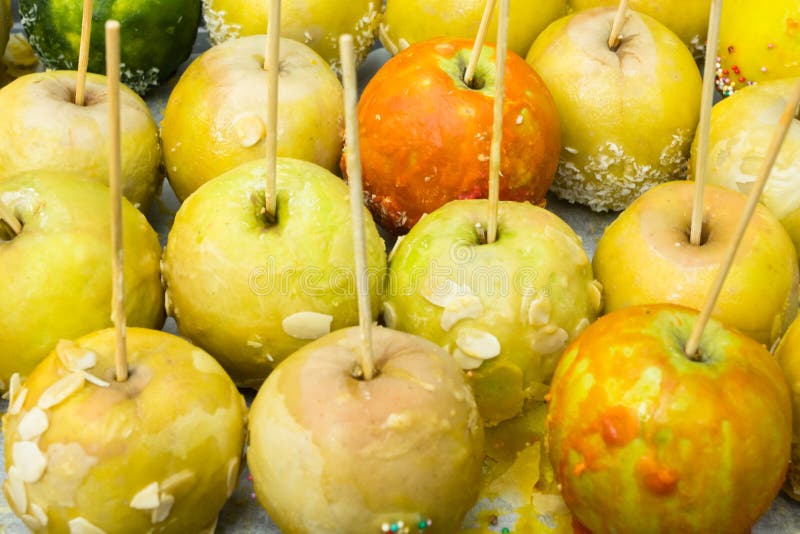 Apples Coated With Red Glaze In Candy Shop Window. Glazed Caramelized