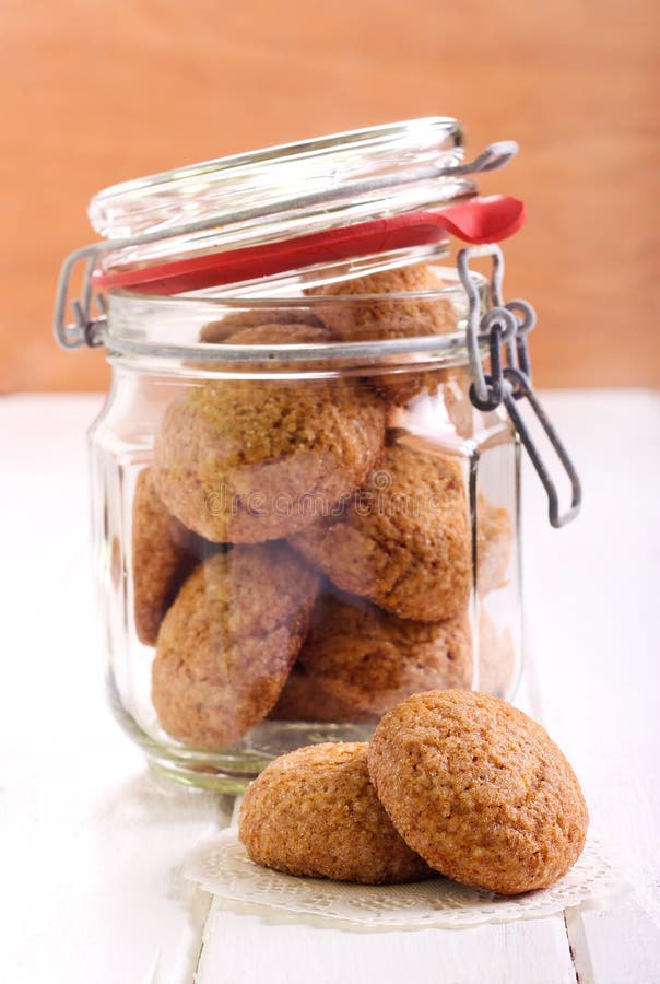 Sugar cookies in a jar on table