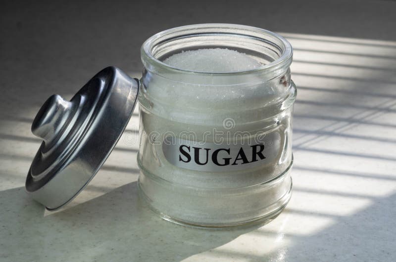 https://thumbs.dreamstime.com/b/sugar-glass-canister-white-container-word-sugar-black-font-white-blurry-background-sugar-glass-canister-white-258058060.jpg