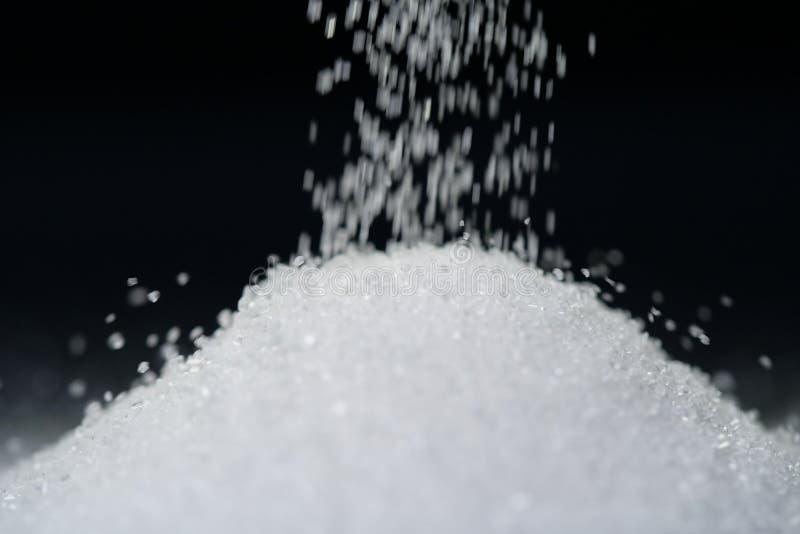 Grains of sugar or sucrose stock photo. Image of grainy 13740248
