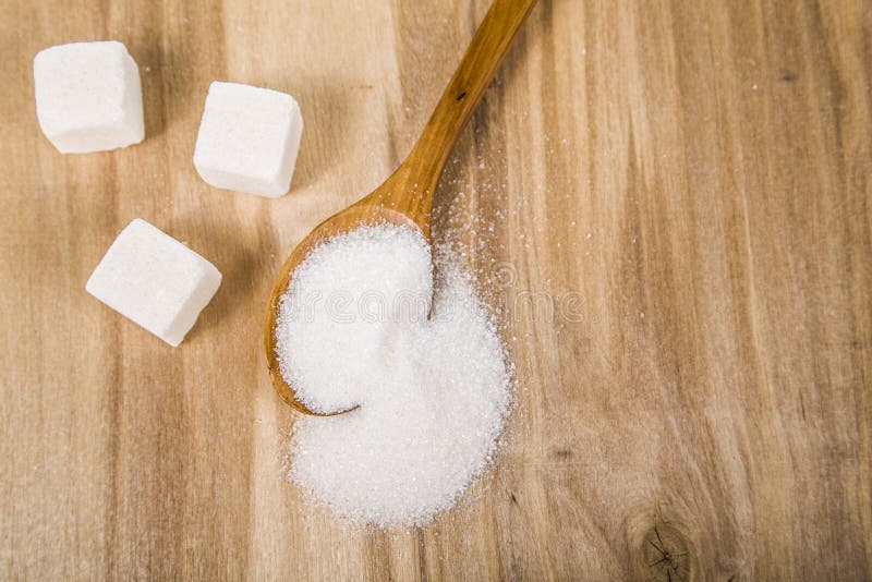 Sugar in a wooden spoon stock image. Image of sweet, food 67303839