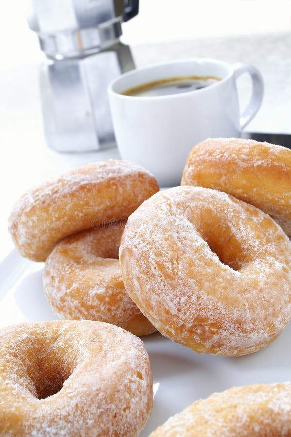 Sugared donuts with coffee stock image. Image of white 38433673