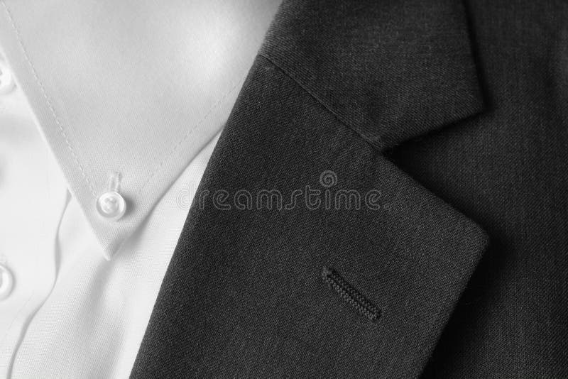 Closeup of suit buttons and lapel for business or formal wear. Closeup of suit buttons and lapel for business or formal wear