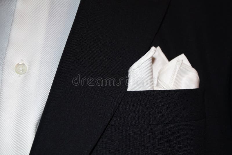 Close up of a black suit with handkerchief