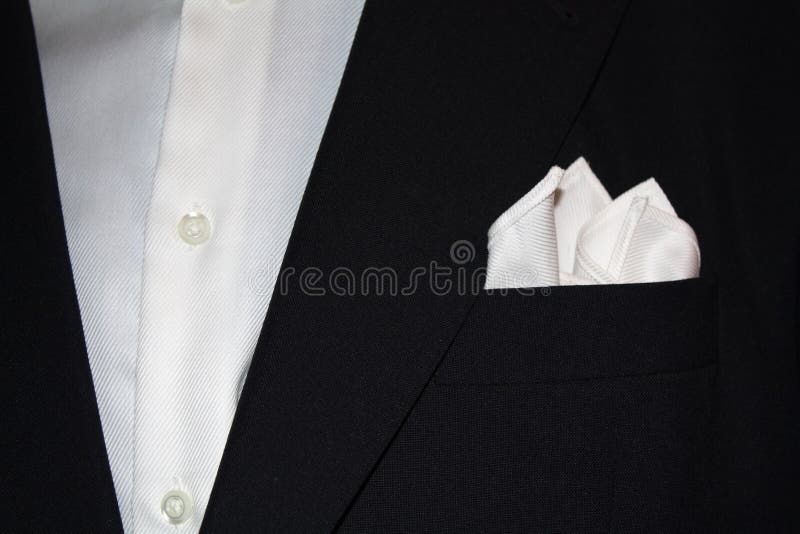 Close up of a black suit with handkerchief