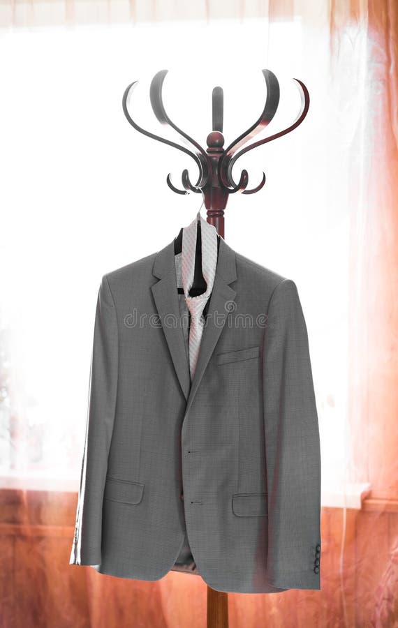 A Grey Tie On A Clothes Hanger Stock Photo Image of hanger, hanging 12045790