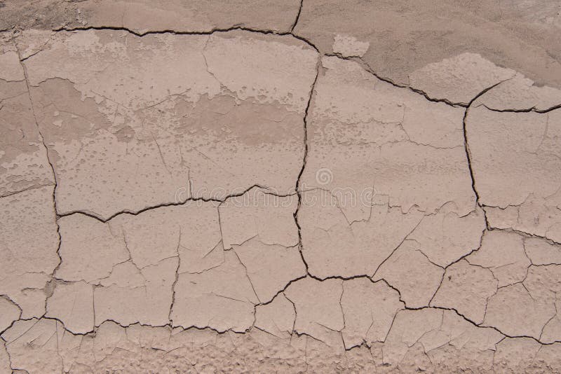 Cracking Dirt in Desert Wash Texture Background. Cracking Dirt in Desert Wash Texture Background