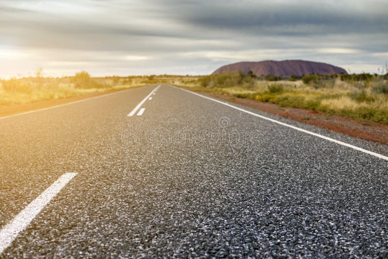 Road to success, straight road through Yulara desert of Alice Springs. Road to success, straight road through Yulara desert of Alice Springs