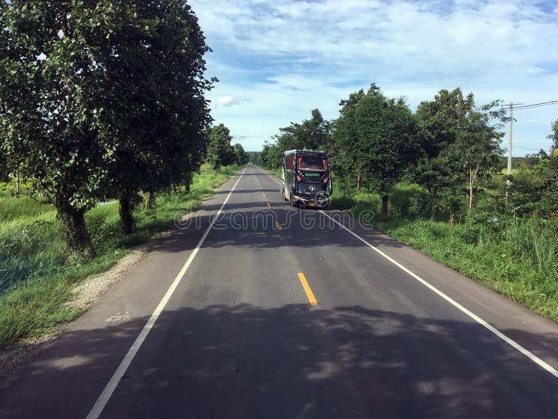 Coach on a road close to Sukhothai. royalty free stock image Coach on a road close to Sukhothai. royalty free stock image