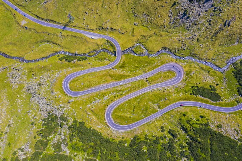 Summer alpine mountain road from above