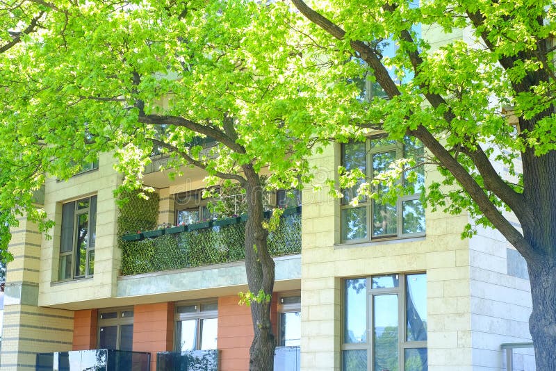 A summer boarding house. balconies in plants with flowers. walking in the cool shade of trees