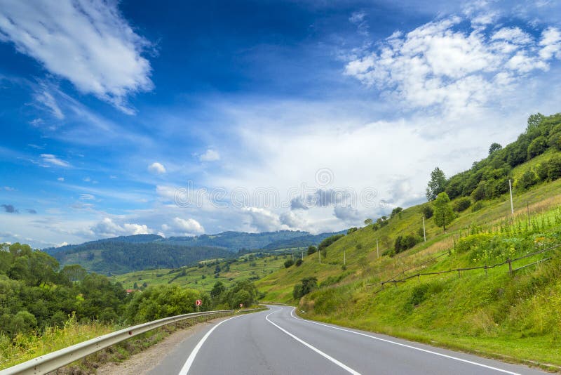 Summer landscape with old barn and asphalt road. royalty free stock images Summer landscape with old barn and asphalt road. royalty free stock images