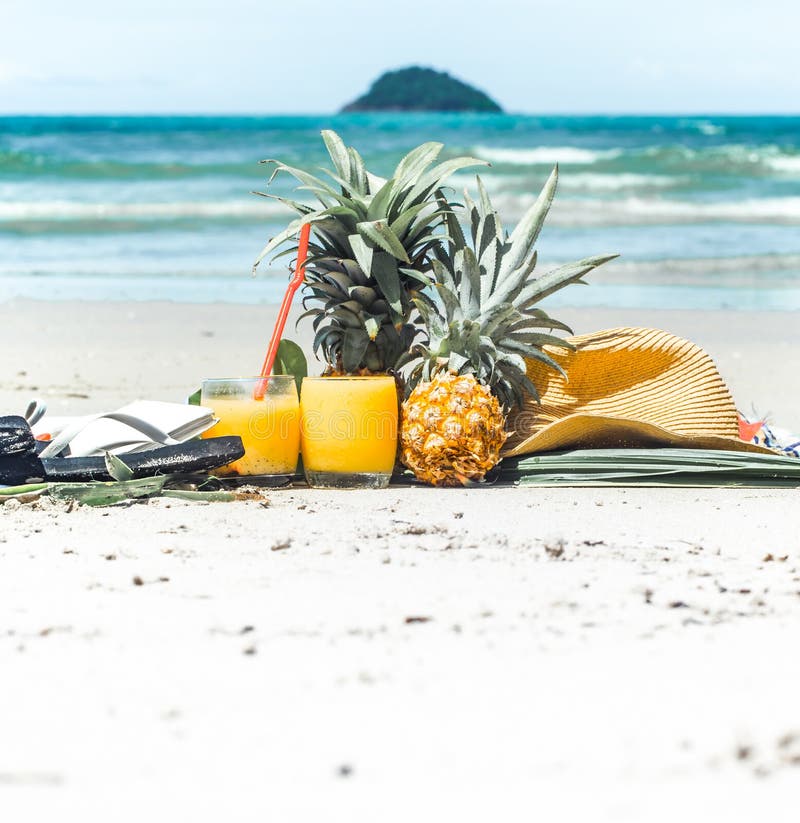 Summer drinks with fruit on the beach, exotic still life stock photography Summer drinks with fruit on the beach, exotic still life stock photography