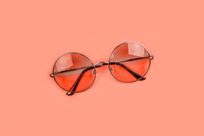 Summer flatlay with sunglasses. Summer flatlay with round gradient sunglasses and sea shells on the bright blue backfround stock photography Summer flatlay with sunglasses. Summer flatlay with round gradient sunglasses and sea shells on the bright blue backfround stock photography