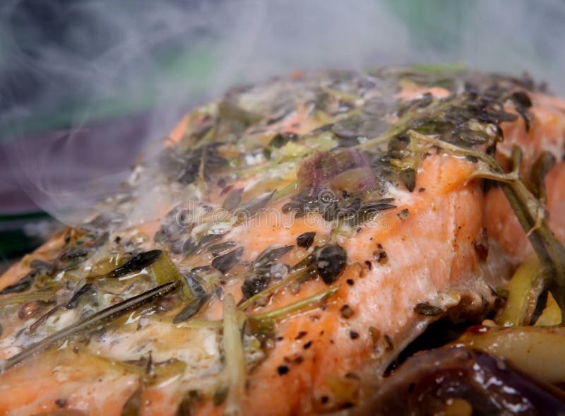 Summer food, rose colored fish steak in a wine marinade