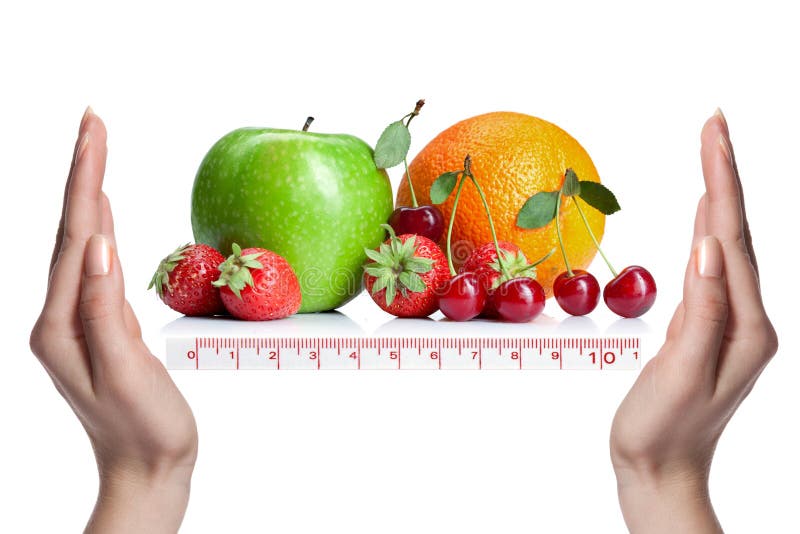 Summer fresh fruits with scale and hands