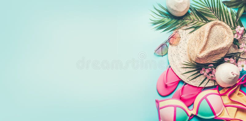 Summer holiday banner. Beach accessories : straw hat, palm leaves, sun glasses, pink flip flops , bikini and coconut cocktail on
