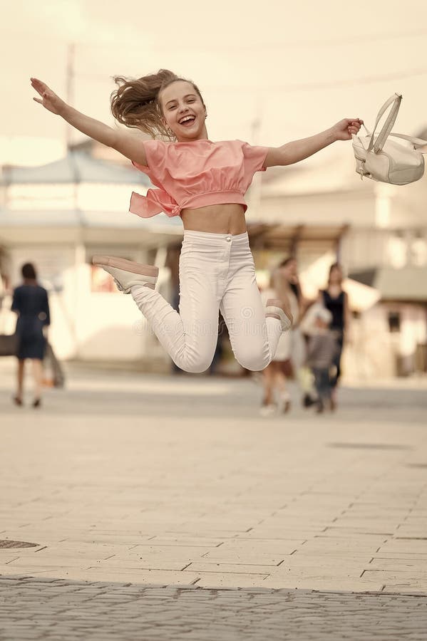 Summer holidays. Charming stylish fashionable girl. Little child enjoy walk. Happy day. Enjoy being teen. Weekend walk royalty free stock images Summer holidays. Charming stylish fashionable girl. Little child enjoy walk. Happy day. Enjoy being teen. Weekend walk royalty free stock images