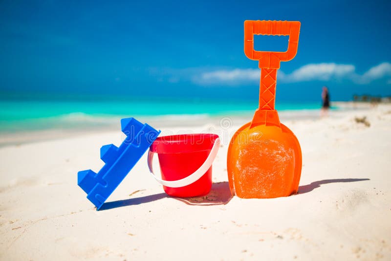 Summer kid s beach toy in the white sand