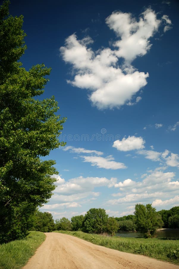 Summer landscape on blue sky background