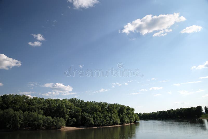 Summer landscape on blue sky background