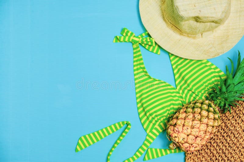 Summer Party. Time To Relax go to beach and Travel with Bikini, Hat and Pineapple Fruit on Pastel Background. Vintage Design Style