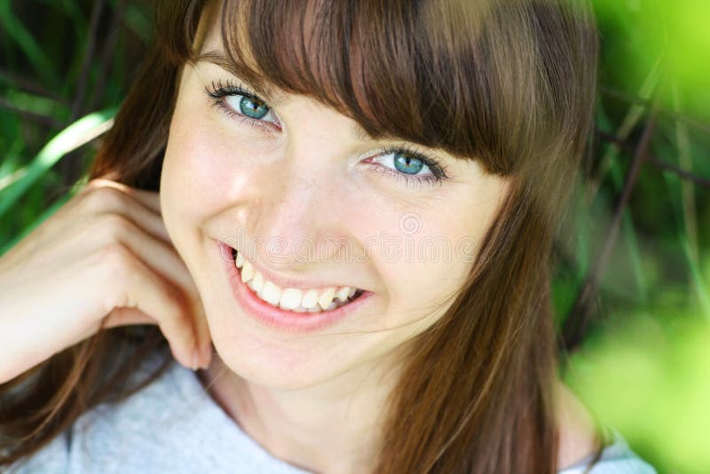 Summer portrait of happy young woman