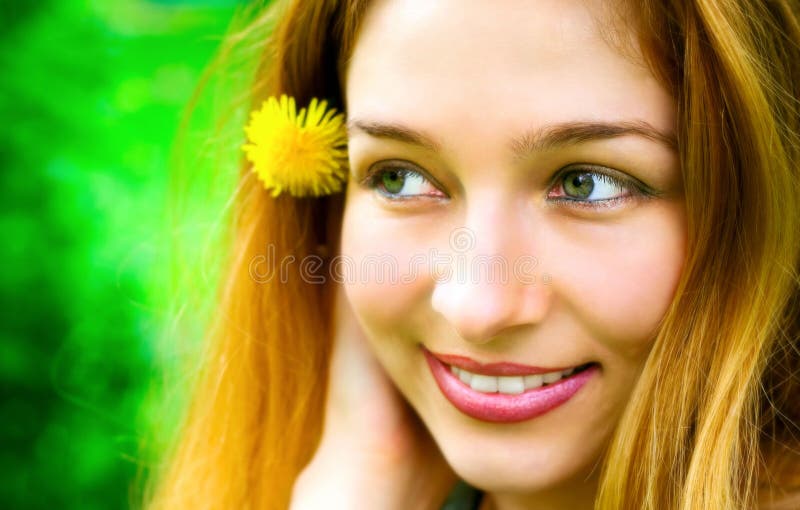 Summer portrait: smile of happy young blond woman