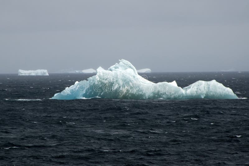 Southern Ocean, Floating Ice With Icebergs In Background Stock Photo - Image of frozen