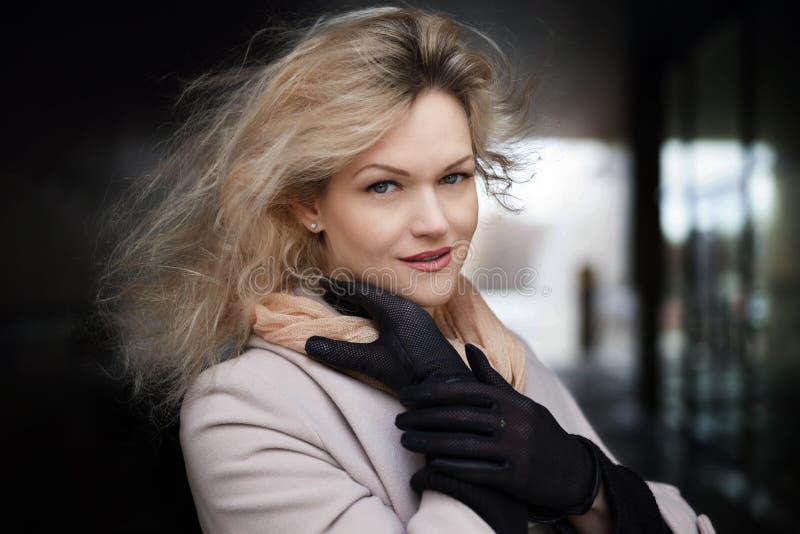 Summer sunny fashion style. Portrait of a young stylish woman outdoors, dressed in trendy outfit and black gloves. royalty free stock photo Summer sunny fashion style. Portrait of a young stylish woman outdoors, dressed in trendy outfit and black gloves. royalty free stock photo