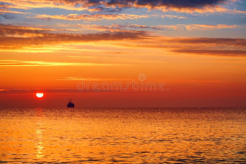 Summer sunrise and Beautiful cloudscape over the sea royalty free stock photos