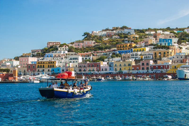 Summer view of little boat with tourist in the Ponza island, Lazio, Italy