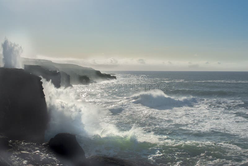 Summertime, Atlantic ocean, waves crashing against rocks, blue sky, turquoise water, drama on the the west coast of Ireland. stock photos Summertime, Atlantic ocean, waves crashing against rocks, blue sky, turquoise water, drama on the the west coast of Ireland. stock photos