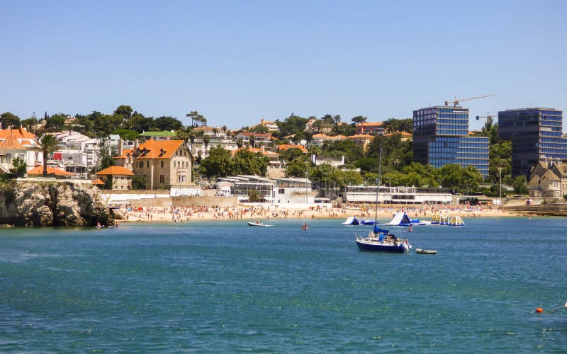 Summertime in Cascais - Conceicao beach crowded with people enjoying the sun