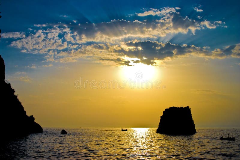 The sun above the sea