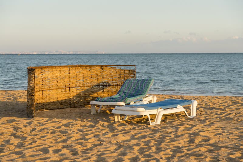 Sun Beds on the Beach. Beach Holiday Concept Stock Image Image of
