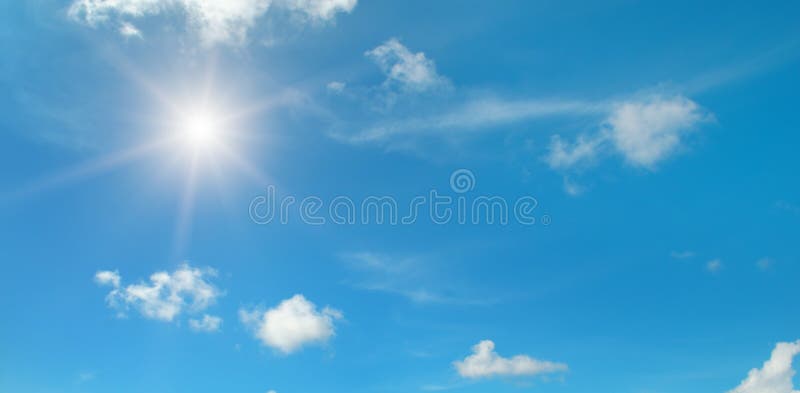 Sun on blue sky and white clouds stock images