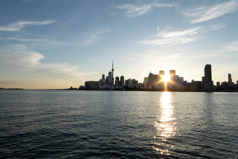Sun Peeking through the Towers of Toronto at Sunset