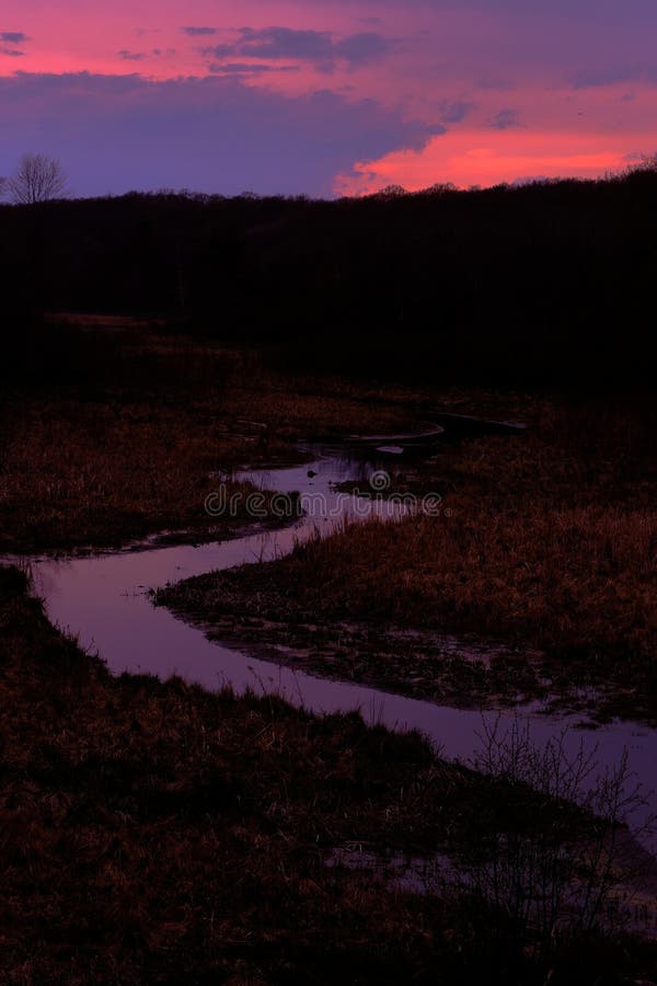 Sun down on the Straight River at the Tunnel Channel Woods near the Ice Age Trail in Polk County, WI during spring. Sun down on the Straight River at the Tunnel stock images Sun down on the Straight River at the Tunnel Channel Woods near the Ice Age Trail in Polk County, WI during spring. Sun down on the Straight River at the Tunnel stock images