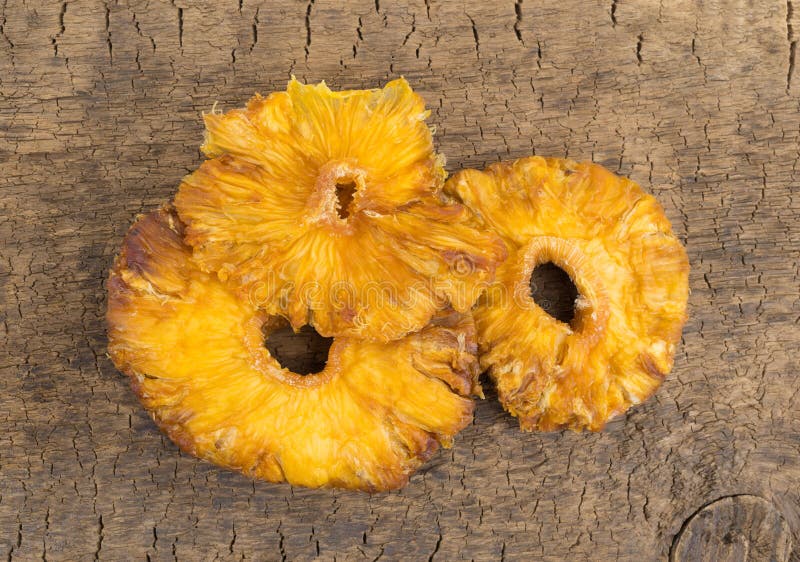 Sun Dried Pineapple Slices on a Wood Board Stock Photo Image of serving, knot 93623734