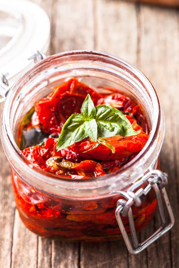 Sun dried tomatoes stock photo. Image of glass, snack 44871590