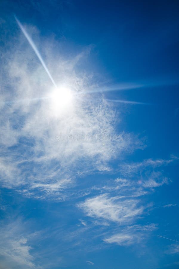 Sun with lens flare, on blue sky background. royalty free stock images Sun with lens flare, on blue sky background. royalty free stock images