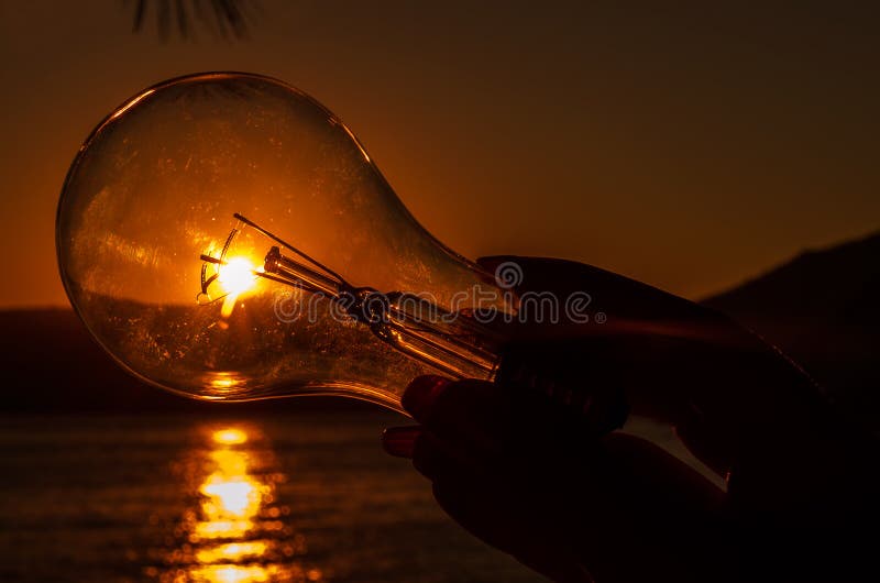 Ideas, the Sun, a Light Bulb. Stock Image Image of electricity, ecology 31347009