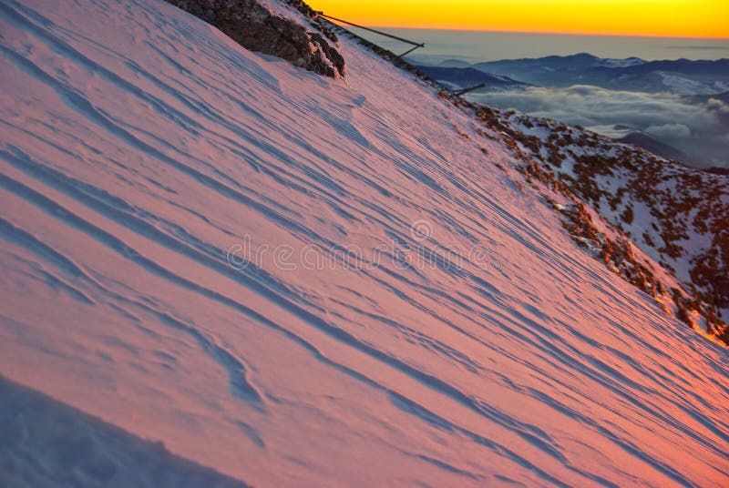 Sun lights reflecting on mountain snow stock photography Sun lights reflecting on mountain snow stock photography