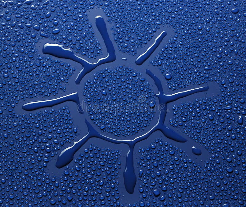 Sun between little water drops on blue