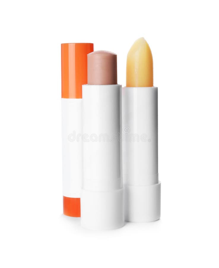 Sun Protection Lip Balms and Leaves on Background, Flat Lay Stock Image