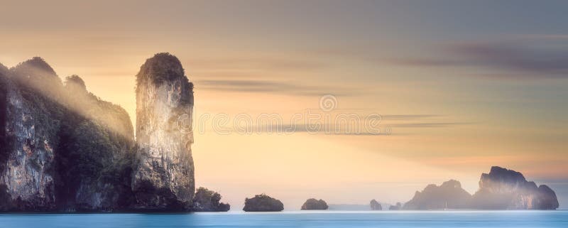 Sun rays over tropical island and sea, Thailand